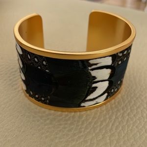 Brackish Dockside Guinea, Pheasant feather cuff. 25 kt gold plated. New in box